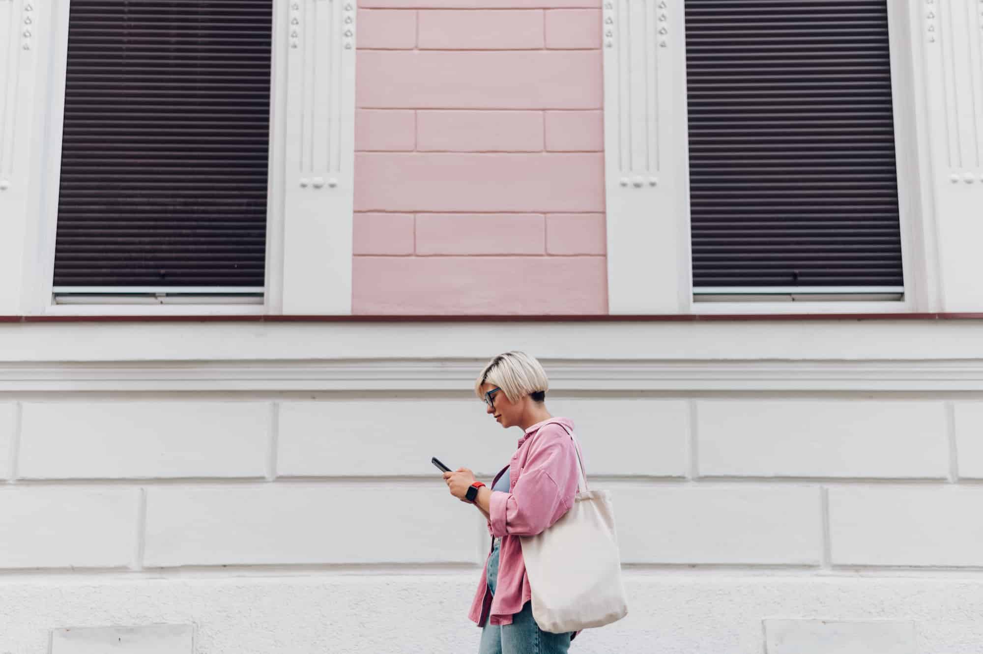 Red hand stop crosswalk sign.