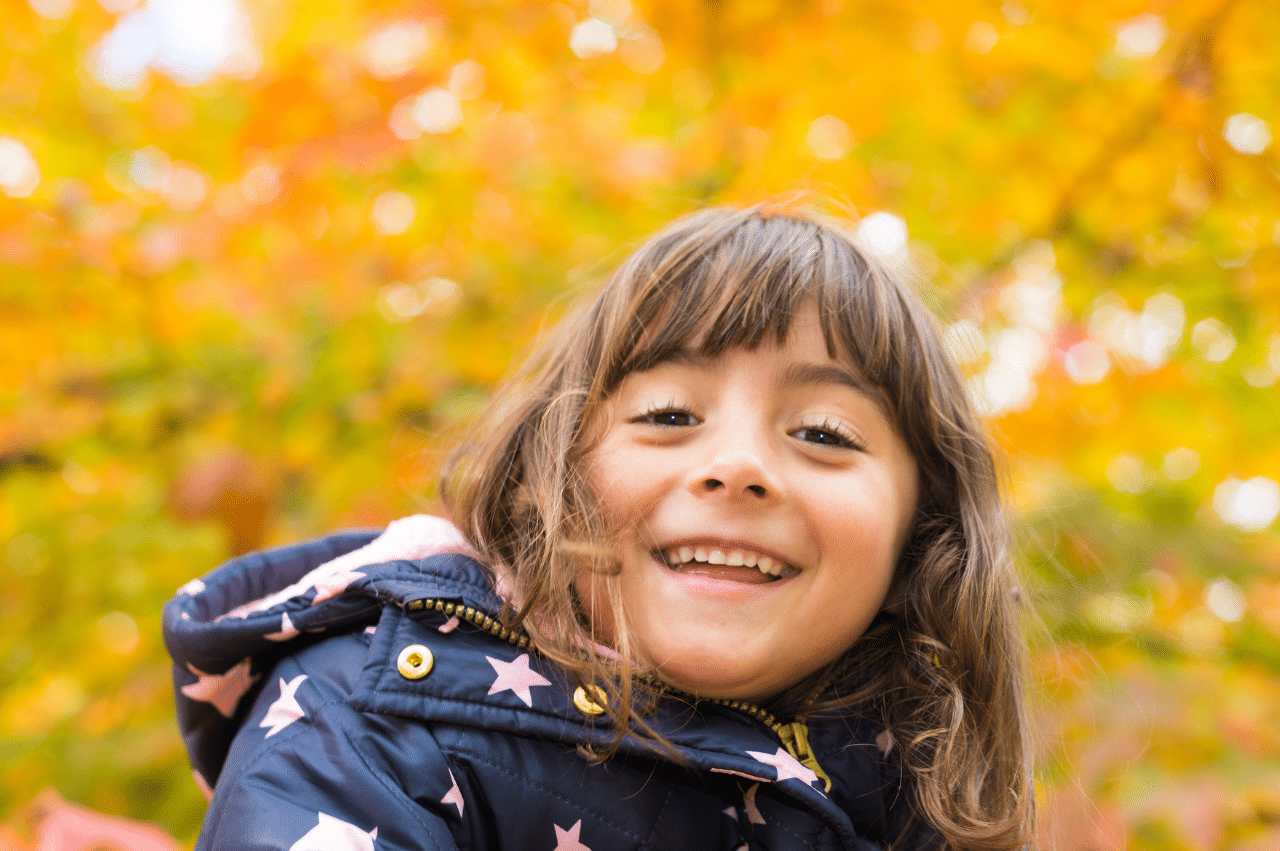 Portrait of a young girl with yellow