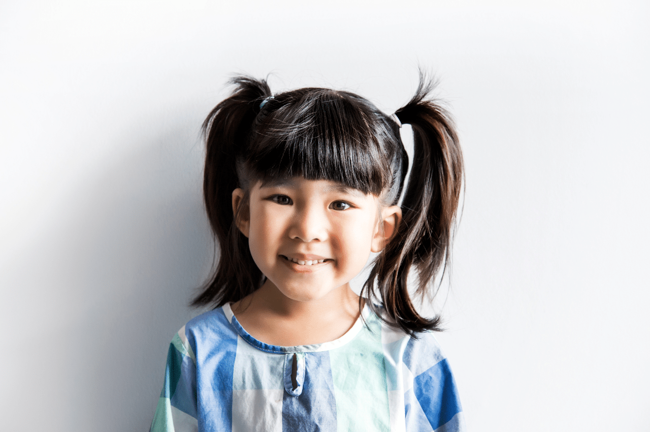 Cute girl with pigtails