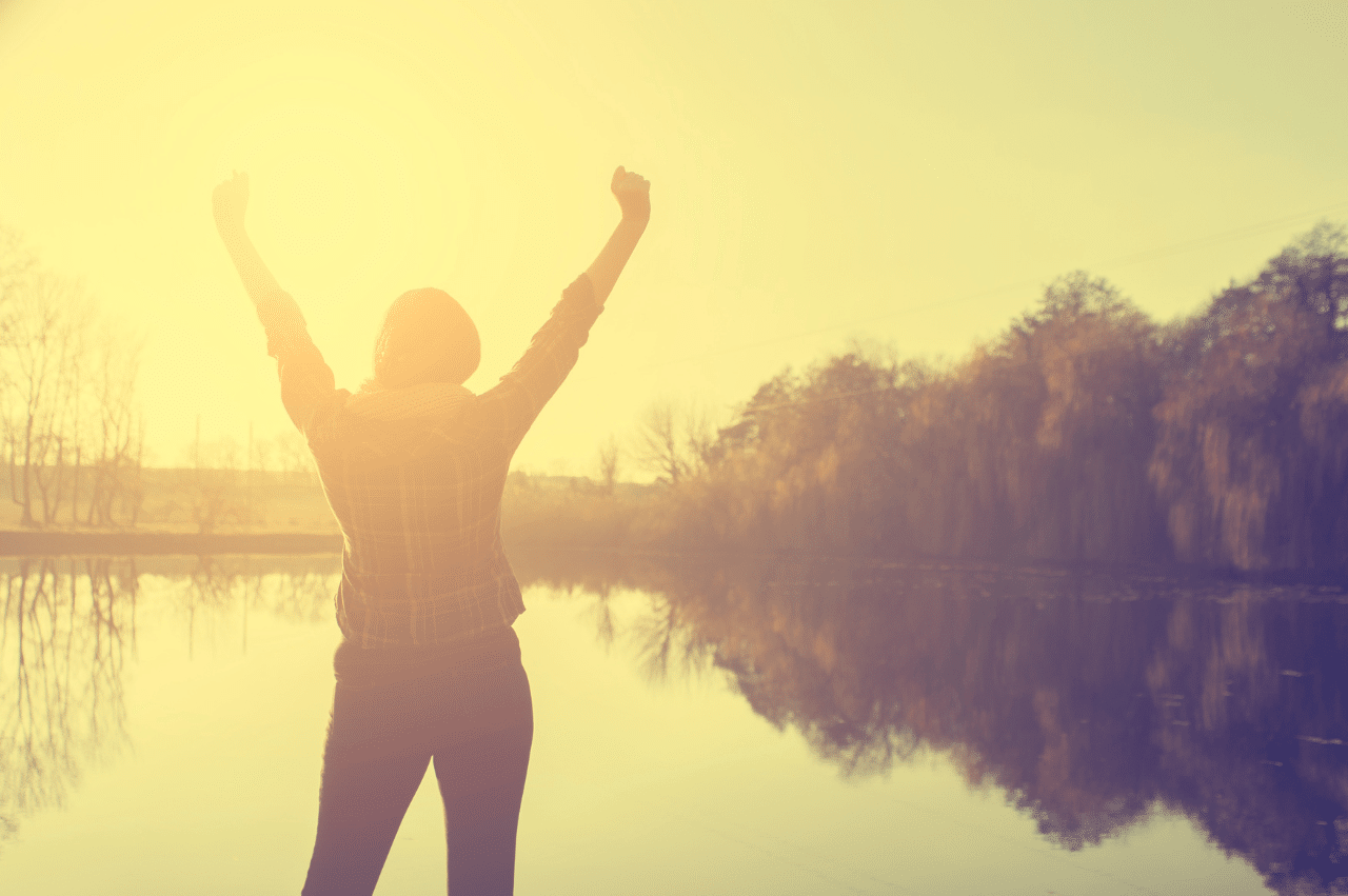 Woman with arms up