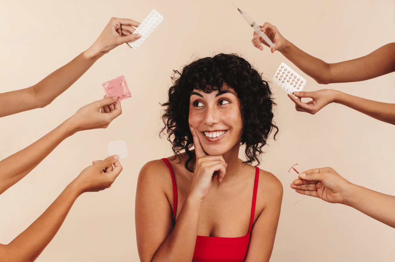 Photo of a woman with different birth control options held around her
